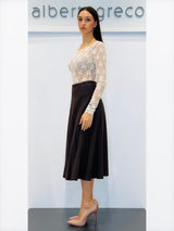 Blusa girocollo in tulle a motivo floreale