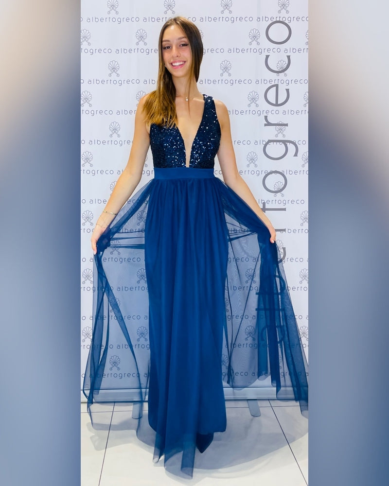 Abito con corpetto in paillettes e gonna in tulle
