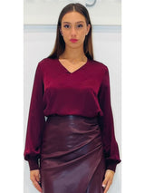 Blusa in raso con scollo a V