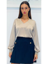 Blusa in raso con scollo a V
