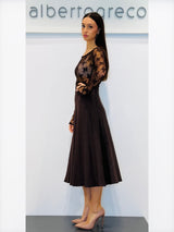 Blusa girocollo in tulle a motivo floreale