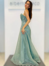 Abito con gonna ampia in tessuto goffrato glitterato