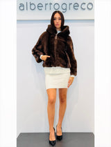 Eco pelliccia corta con cappuccio