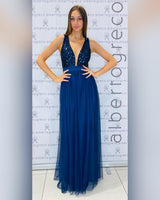 Abito con corpetto in paillettes e gonna in tulle