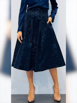 Gonna midì a pieghe in tessuto damascato