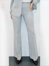 Pantaloni flare in tessuto fiammato