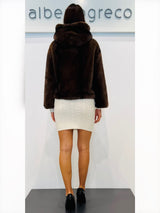 Eco pelliccia corta con cappuccio