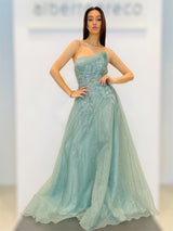 Abito con gonna ampia in tessuto goffrato glitterato