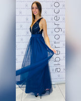 Abito con corpetto in paillettes e gonna in tulle