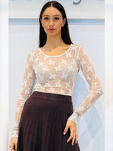 Blusa girocollo in tulle a motivo floreale